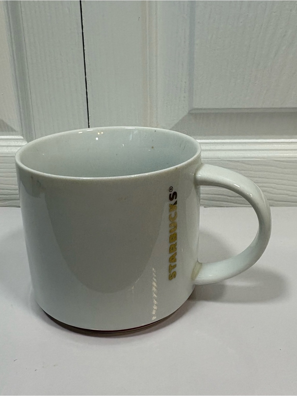 Starbucks 2012 16 oz Mug White Gold Logo Red Stripe Discontinued